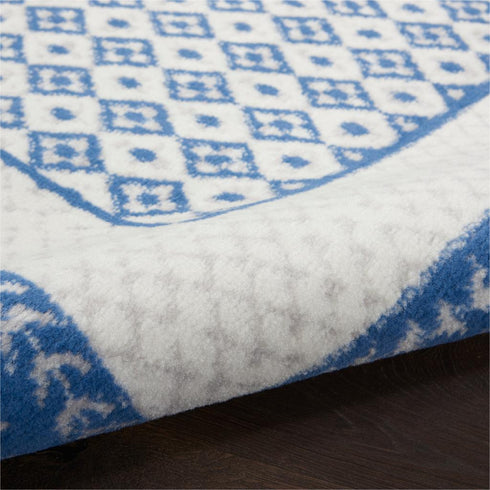 Ivory and Blue Geometric Area Rug